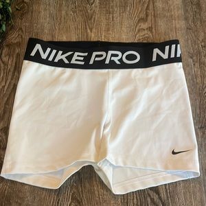 Women’s white Nike Pro spandex running shorts sz M